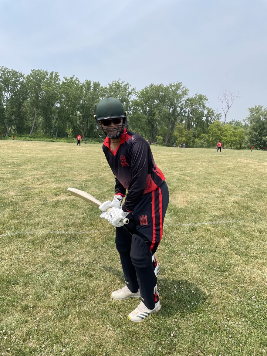 Rochester United cricketer Saad Jamshed gets ready to bat at the South Buffalo Charter School cricket ground. 