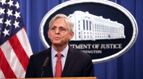 Attorney General Merrick Garland speaks at the Justice Department in August.