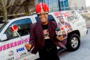 Gary Boyd, known as “Mister Gary” on the public access television show “Them Yo People” poses in front of his car on Monday, March 14, 2022, outside of the St. Louis Public Radio headquarters in Grand Center.