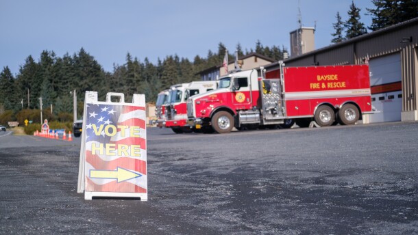 A "VOTE HERE" sign in front of the Bayside Fire Department building, Oct. 7, 2025