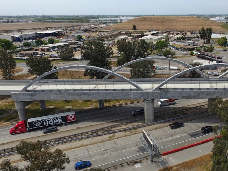 FILE: The Cedar Viaduct, designed to take high-speed trains over Cedar and North avenues and State Route 99, is shown in an aerial view, Tuesday, April 15, 2025, in Fresno, Calif.