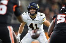 FILE - California Golden Bears linebacker Luke Ferrelli (41) rushes against Oregon State during the first half of an NCAA college football game, Aug. 30, 2025, in Corvallis, Ore. (AP Photo/Mark Ylen, File)