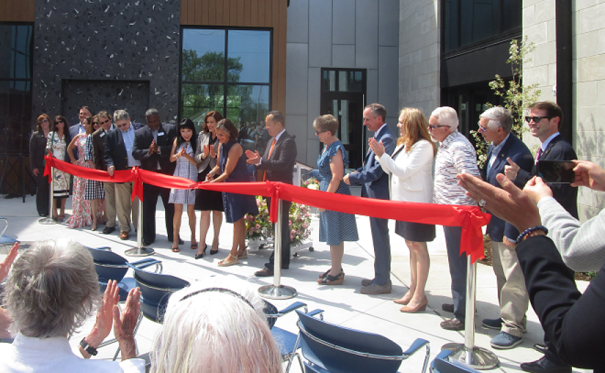 Ribbon-cutting ceremony in front of the new Charles & Lynn Zhang Portage Community Senior Center