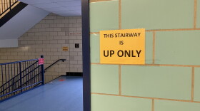 photo of sign saying this stairwell is up only