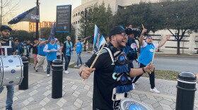 Charlotte FC supporters practiced their chants and march outside of Bank of America Stadium on Wednesday, ahead of the club's first-ever home match.