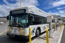 FILE - All-electric TheBus in Honolulu.