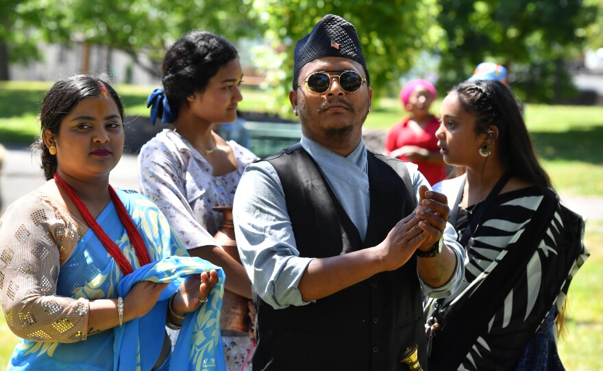 Nanda and Deepa Iagun and their daughters Bhawana, 16, and Sristee, 10, wait to perform a Nepalese cultural dance.