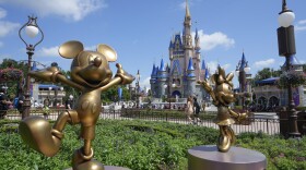 FILE - The Cinderella Castle is seen at the Magic Kingdom at Walt Disney World, July 14, 2023, in Lake Buena Vista, Fla. Months after Disney and Florida Gov. Ron DeSantis' appointees agreed to end a protracted legal fight, the two sides are set to approve an agreement Wednesday, June 5, 2024, that could result in the company investing $17 billion into its Florida resort and opens the door to a fifth major theme park at Walt Disney World. (AP Photo/John Raoux, File)