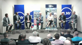 Rep. Paul Tonko at center stage during roundtable discussion at Albany NanoTech Complex, June 17, 2022.