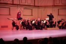 A member of the St. Louis Dance Theatre leaps across the Powell Hall stage in a performance with the St. Louis Symphony Orchestra led by Stéphane Denève, January 2026