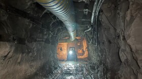 A loader prepares the Pinyon Plain Mine for uranium ore production on its lowest level more than 1,400 feet underground on Sept. 8, 2023.