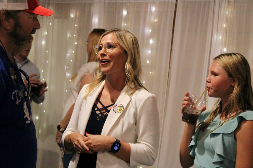Stephanie Wise talks to supporters at her watch part during the primary.