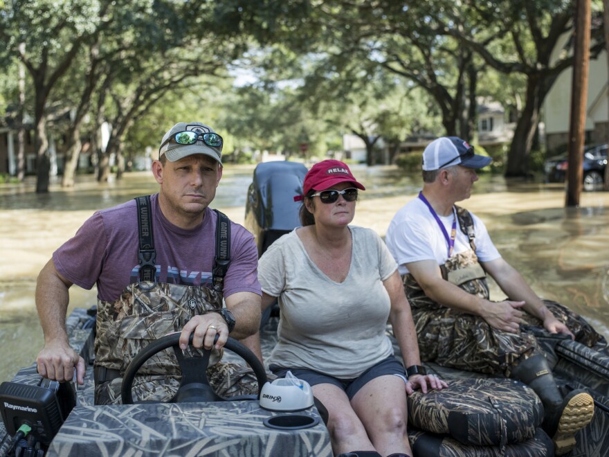 Hinkie takes the McKnights to their flooded home to get personal items. "What caught me by surprise was that I was bringing people to their homes for the first time," Hinkie said. "They finally see what they had known, but had not yet seen it with their own eyes."