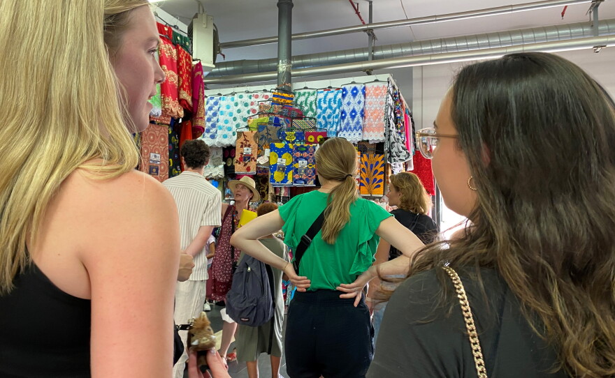 UofA students tour a textile market in Rome for their global studies course.