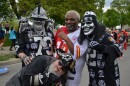 Kansas City Chiefs and Las Vegas Raiders fans put their rivalry aside to pose for a photo on April 27, 2023.