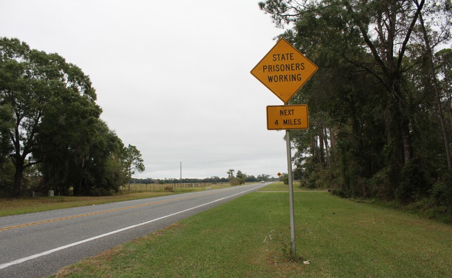A sign marks a state prisoner work zone on the road leading to Union Correctional Institution on Tuesday, Oct. 28.