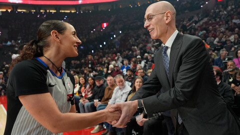 NBA commissioner Adam Silver greets NBA referee Ashley Moyer-Gleich as he arrives for an NBA basketball game between the Portland Trail Blazers and the Utah Jazz, Friday, March 13, 2026, in Portland, Ore. (AP Photo/Jenny Kane)