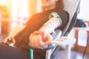 This stock photo shows a woman donating blood.