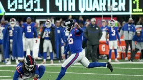 New York Giants place kicker Randy Bullock (46) kicks a field goal against the Green Bay Packers with one second remaining during the fourth quarter of an NFL football game, Monday, Dec. 11, 2023, in East Rutherford, N.J. The kick was good giving the Giants the win. (AP Photo/Seth Wenig)