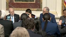 Federal, state and tribal leaders officially signed an agreement Friday to better protect salmon in the Columbia River and halt court cases for the next 10 years.