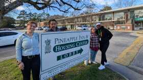 Director of Operations Grace Granger, Assistant Manager Jose Alvarez, Be The Change Hospitality Director of Community Outreach Amy Lee and FaithWalkers Co-founder Marty Wright outside of the Pineapple Inn and Housing Center on Thursday, Jan. 22, 2026