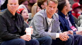 LSU football head coach Lane Kiffin, right, watches an NBA basketball game between the Houston Rockets and the Dallas Mavericks, Saturday, Jan. 31, 2026, in Houston. (AP Photo/Eric Christian Smith)
