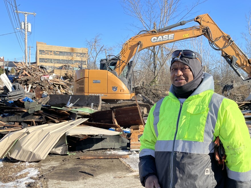 Jimmy Galbreath stands in front of the ruins of his former homes in Mayfield.