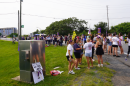 Dozens of hospital workers and community members lined both sides of the road leading to the Mount Nittany Medical Center Monday in State College. Unionized workers are looking for higher wage increases across the board. 