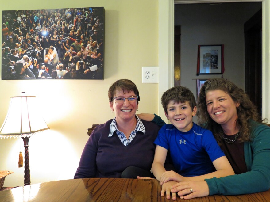 Francine Robin Simon (left) and Anna Simon with their son, Jeremy, in their home in Denver. Anna and Francine were one of the first same-sex couples in Colorado to obtain a civil union.