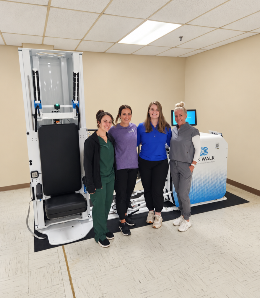From left, Allied physical therapists Rosa Bartoletti, Sarah Prebich, Ashlynn Fitzgerald and Jennifer Lutkowski, director of rehabilitation use the Rise&Walk on some of their patients.