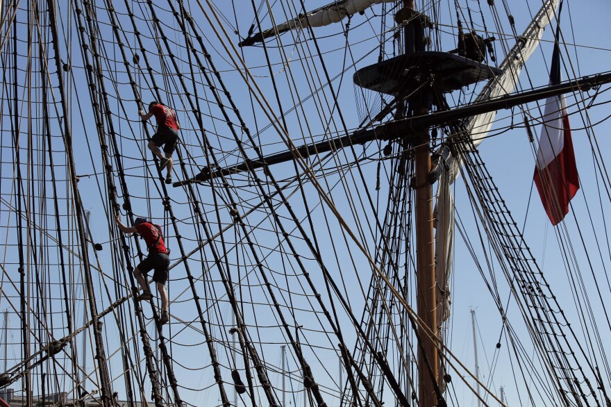 Sailors climb in the three masts of the 213-foot-long frigate Hermione during preparations to sail across the Atlantic, in La Rochelle, southwestern France.