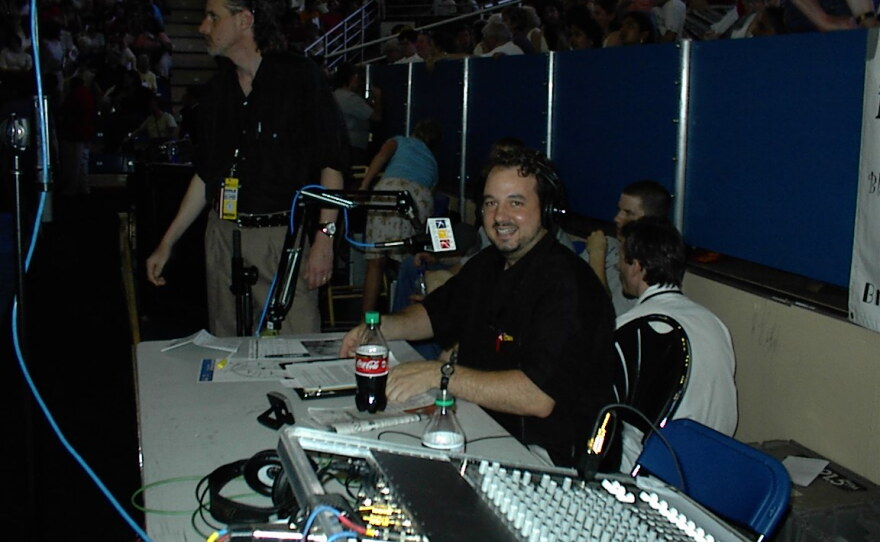 KPR recording engineer Chuck "Chubby" Smith (at left) joins KPR News Director J. Schafer (at right) during a live broadcast of former President Bill Clinton's visit to the University of Kansas to receive the Dole Leadership Prize in November of 2025.