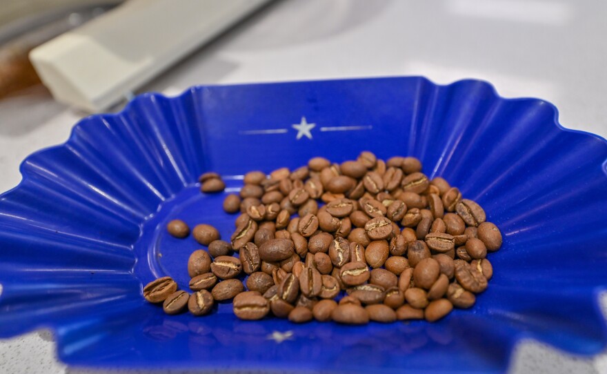 Coffee beans are measured before making a cup of coffee at Electric City Roasting.