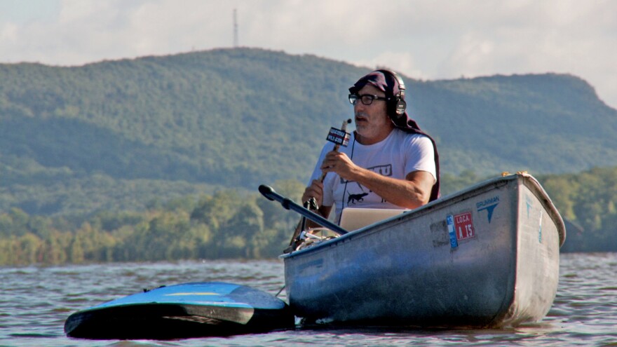 WFMU General Manager Ken Freedman broadcasts from a boat.