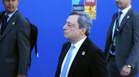 Italian Prime Minister Mario Draghi, center, arrives for the NATO summit in Madrid, Spain on Wednesday, June 29, 2022.