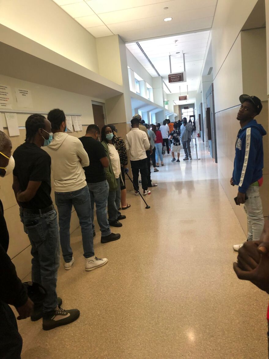 Over 60 people wait to be seen by a judge at the Durham County courthouse.