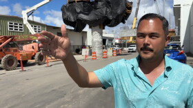 Tyler Dos Santos-Tam points out streets in the Iwilei neighborhood on Monday, Oct. 5, 2026 where the Skyline rail line is being built in Honolulu.