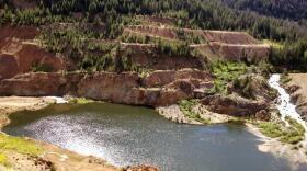 The so-called Glory Hole on the East Fork of the South Fork Salmon River in the historical Stibnite Mining District of central Idaho. During World War II this area was excavated for tungsten and antimony.