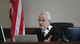 Judge John Pacht is presiding over the trial.