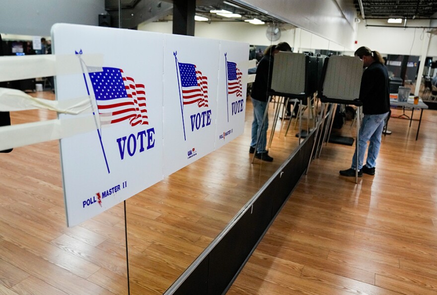 An Ohio voter fills out a paper ball