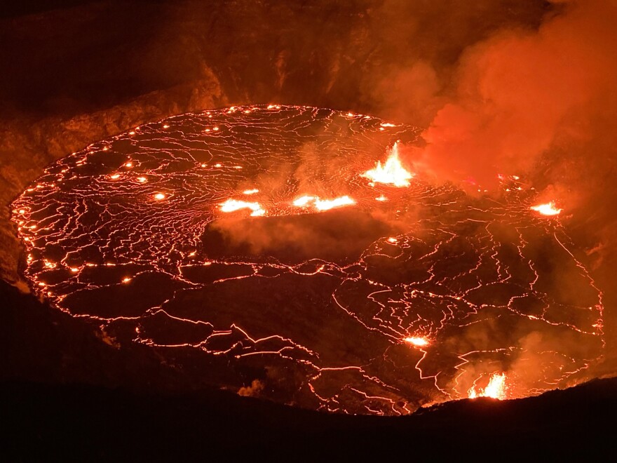 This photo provided by USGS Volcanoes shows the eruption within in Kilauea volcano's Halemaumau crater at the volcano's summit on Wednesday, Sept. 29, 2021. One of the most active volcanos on Earth is erupting on Hawaii's Big Island. O (USGS via AP)