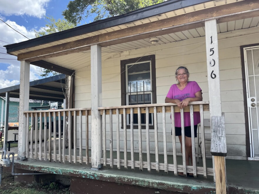 Leticia Tapia poses for a portrait at her Westside home on Aug. 30, 2026. Despite the high heat, storm damage and power outages, she is proud of her her community has come together.