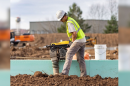 A LiUNA union member works on a job site.