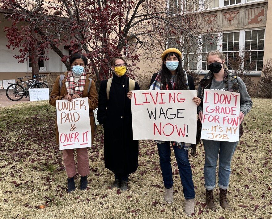 Graduate assistants during the occupation of UNM's Scholes Hall December 7th. They worked from the administration building to demonstrate their labor to university President Garnett Stokes and others.