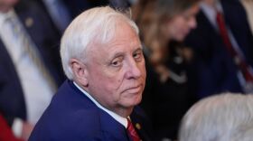 Sen. Jim Justice, R-W.Va., listens as President Donald Trump speaks during an event on energy production in the East Room of the White House, April 8, 2025, in Washington.