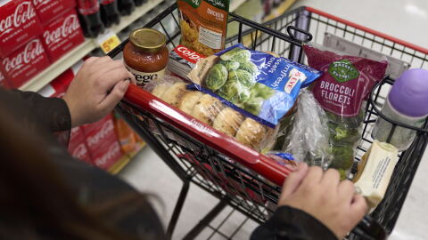 Jaqueline Benitez, who depends on California's SNAP benefits to help pay for food, shops for groceries at a supermarket in Bellflower, Calif., on Monday, Feb. 13, 2023. Nearly 30 million Americans who got extra government help with grocery bills during the pandemic will soon see that aid shrink. (AP Photo/Allison Dinner)