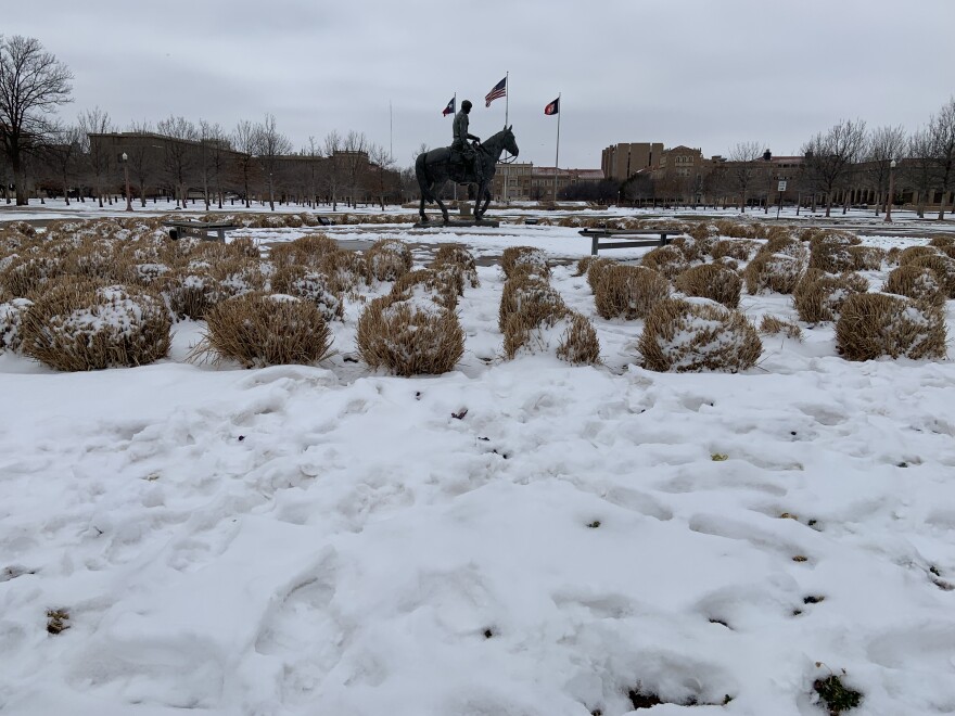 The Will Roger's statue on Texas Tech University's campus sits frozen during the massive winter storm in 2021.