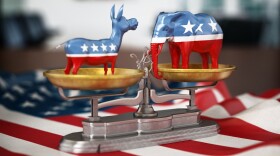 3D Illustration of Republican and Democrat party political symbols elephant and donkey being weighed on the American flag.