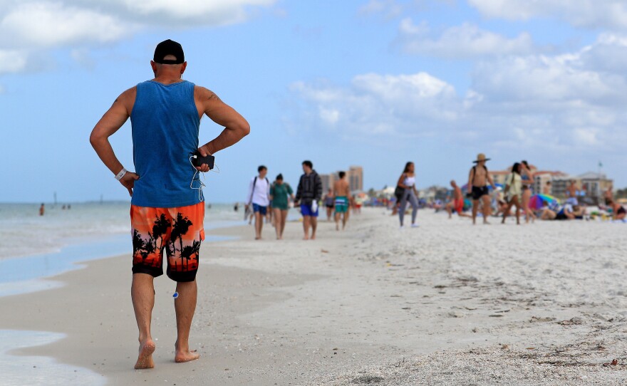 People continued to gather on Florida beaches such as Clearwater Beach after the coronavirus had already started to spread in the U.S. On March 20, the city of Clearwater ordered all its public beaches to close. As of Friday, Florida has more than 2,400 confirmed coronavirus cases and 29 deaths.