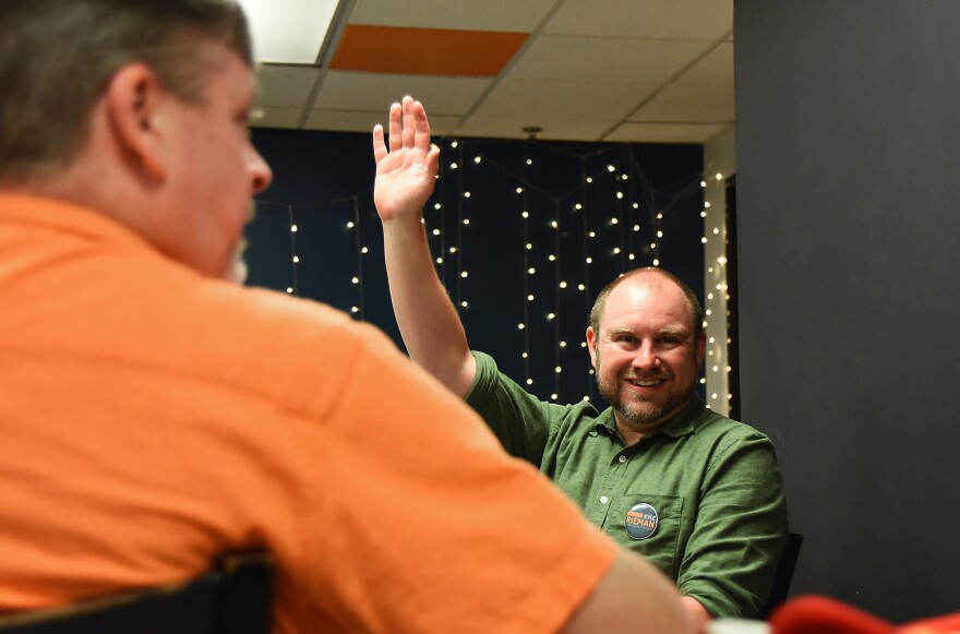 Kyle Rieman welcomes attendees to his watch party on Tuesday at Hexagon Alley in Columbia. Rieman will serve his second term as Boone County auditor.